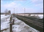 Neuerdings wird schon Schnee transportiert hier auf Flachwagen am 20.2 bei Lneburg. Gru an den TF und danke frs Horn.