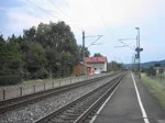 152 156 durchfährt am 04.Juni 2011 mit einem Containerzug den Bahnhof Gundelsdorf Richtung Saalfeld(S).