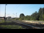152 095 durchfhrt am Abend des 27.Augusts 2011 mit einem Containerzug den Bahnhof Gundelsdorf Richtung Kronach.