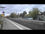 152 028 durchfhrt am 12.Oktober 2011 mit einem Containerzug den Bahnhof Sarstedt Richtung Kreiensen.