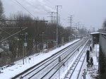 RE nach Cottbus, geschoben von einem Taurus (BR 182) am 9.2.2012 bei der Durchfahrt durch den Regionalbahnhof Karlshorst.