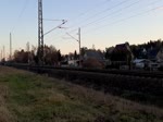 482 032 am 19.12.2020 um 15:37 Uhr auf der Strecke Kohlfurt-Roßlau zwischen Elsterwerda-Biehla und Bad Liebenwerda, hier auf der Höhe des ehemaligen Haltepunktes Haida. Sie zog mit aller Kraft 2 Kesselwagen der Wascosa und einen Kohlestaubwagen der Ermewa.