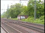 Eine 185 fuhr mit einem Containerzug durch den Bahnhof Hamburg-Harburg am 22.5.