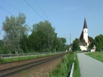185 572 mit einem Getreidezug am 28.06.2012 bei Hausbach.
