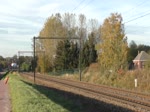 Railpool/Lineas mit 186 452-9 zieht laut hupend einen gemischten Güterzug durch Hoeselt Richtung Tongeren und weiter Aachen-West.