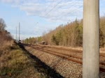 189 098 der niederländischen MRCE auf der Strecke Dessau-Roßlau nach Kohlfurt am 20.12.2020 um 11:03 Uhr zwischen Bad Liebenwerda und Elsterwerda-Biehla.