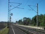189 064 durchfährt am 25.Mai 2011 mit einem Getreidezug den Bahnhof Gundelsdorf Richtung Kronach. Danke für den Lichtgruss.