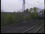 Überholung eines Sonderzuges mit Dampflok durch Interzonenzug mit 110 am 28. April 1990 zwischen Gütersloh und Hamm