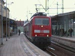 Ausfahrt RE in Lehrte mit BR 111, am 09.Mrz 2010.