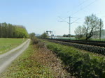 Baureihe 111 mit Nahverkehrzug auf der Kinzigtalbahn (Hessen) zwischen Gelnhausen und Langenselbold am 8.4.2011.