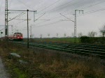 Eine Lok der Baureihe 111 fhrt am 28.03.09 mit einem RE von Bielefeld kommend in Richtung Braunschweig Hbf.