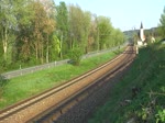 111 031 mit einem RE nach Nürnberg am 23.04.2011 bei Hausbach.