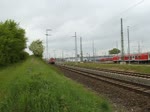 112 106-0 mit RE 4306 von Rostock Hbf nach Hamburg Hbf kurz nach der Ausfahrt im Rostocker Hbf recht´s das BW Rostock Hbf.(16.05.2011)