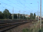 In die Abendsonne nach Warnemnde fhrt 113 309-9 mit ein paar Kreuzfahrer-Touris und dem Bahn-touristexpress.