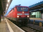114 033-4 mit RE33103+alten Dostos von Rostock Hbf Richtung Lutherstadt Wittenberg bei der Ausfahrt im Rostocker Hbf.(13.03.10)