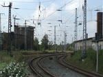 Die zur Zeit lteste E10 im Planeinsatz bei DB als 115 114 mit IC 1961 bei der Ausfahrt in Rostock.