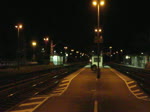 115 346 zieht am 8. September 2011 den PbZ nach München bestehend aus einer 143 und einem Nachtzug Wagen durch Kronach.