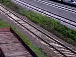 BR 140 mit einem Schotterzug bei der Einfahrt in den Seelzer Rbf.