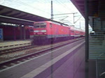 Rostocker S-Bahn wird von einer E-Lok (BR 143) am 10.07.2012 gezogen und fhrt nach Warnemnde.