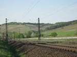 151 143 zog am 23.04.11 einen Autozug durch Himmelstadt Richtung Wrzburg.
