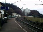 155 038-3 fhrt mit einem Containerzug durch Istein in Richtung Freiburg(Brsg).