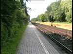 Eine 155 fuhr mit einem GZ durch Bahnhof Prisdorf.