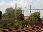 155 098-7 mit einem gemischten Gterzug bei der Durchfahrt des S-Bahnhofes Hannover Linden/Fischerhof am 23.05.2009.