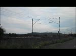 155 232 ist am 09.September 2011 mit einem Containerzug(!) bei Halach unterwegs.