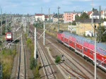 Whrend eine RB in den Bahnhof Bitterfeld einfhrt, verlsst IC 2354 den Bahnhof zur Fahrt nach Dortmund Hbf. (12.09.2009)