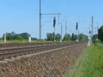 101 124-6 mit dem ICE 1100 von Berlin Sdkreuz nach Hamburg-Altona in Friesack(Mark). 30.05.2011