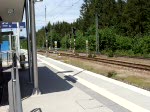 Durchfahrt eines G�terzuges mit �BB 1044, im Bf.