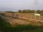 247 020-1 auf dem Weg mit Ihrem Containerzug vom Jade-Weser-Port über`s Wilhelmshavener Industriegleis ins Hinterland.