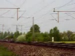 1503 der VPS fuhr mit einem Containerzug am 17.04.2009 in Richtung Seelze.Gefilmt bei Dedensen/Gmmer
