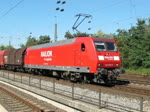 145 005-5 fhrt am 6. September 2010 mit Teleskophauben- und Schiebeplanenwaggons fr den Blechrollentransport durch Bochum-Langendreer.