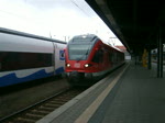 RE33313 von Stralsund Richtung Ostseebad Binz bei der Ausfahrt   um 15.04 Uhr im Bahnhof Stralsund.(09.04.10)