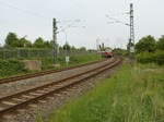 RE 13010 von Sassnitz nach Rostock Hbf kurz vor der Einfahrt im Rostocker Hbf.(20.05.2011)
