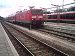 RE38590 von Berlin Hbf (tief) nach Warnemnde kurz vor der Ausfahrt im Rostocker Hbf.(09.08.08)