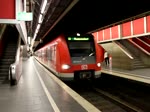 423 142-8 als S3 von Holzkirchen nach Mammendorf bei der Ausfahrt im Bahnhof Mnchen Hbf(tief).Gefilmt am 24.04.2011