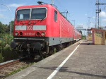 143 952-0 mit S3 von Rostock-Seehafen/Nord nach Rostock Hbf.kurz vor der Ausfahrt im Haltepunkt Rostock-Kassebohm.(07.08.09)