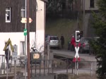 99 1793-1 und 99 1741-0 fahren am 30.12.2015 mit dem P 1005 (Cranzahl - Oberwiesenthal) durch die Ortschaft von Neudorf (Erzgebirge).