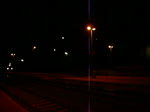 Der Turmtriebwagen 704 004-1 durchfhrt am 26. Juni 2010 gegen 23 Uhr den Bahnhof Kronach in Richtung Norden.