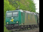 185-CL 006 mit Kesselwagenzug in Fahrtrichtung Norden bei Asmushausen. Aufgenommen am 01.05.2010.