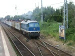   D06(Regental Cargo ex 231 012)mit Holzzug von Rostock-Bramow nach Stendal–Niedergrne bei der Ausfahrt um 17.55 Uhr im Bahnhof Rostock-Bramow.(28.07.09)     