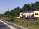 ME 82132 (Göttingen–Hamburg Hbf) und KT 62918 (Hamburg-Billwerder–Neuss Gbf) am 05.06.2016 in Unterlüß