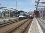 OLA80031 von Rostock Hbf.nach Gstrow bei der Ausfahrt im Rostocker Hbf.Rechts steht RB33367 von Rostock Hbf.nach Graal-Mritz.21.06.09