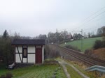 253 015-8 der Press zu sehen am 09.12.14 in Jößnitz/V.mit einem Leerholzzug.