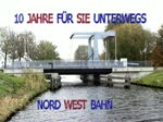 10 JAHRE FÜR SIE UNTERWEGS Nord-West-Bahn beim überqueren des Ems-Jade-Kanal´s bei Sande.