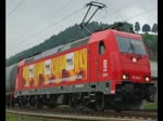 185 586-5  Heizl Profi  mit passendem Kesselwagenzug in Fahrtrichtung Norden.