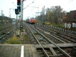 Lok der BR 232 mit Gterzug und Ausfahrender Metronom in Hamburg-Harburg.