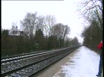 Eine Nord-Ostsee Bahn durchfuhr am 19.12 den Bahnhof Prsidorf um in 15 Minuten den Bahnhof Hamburg-Altona zu errreichen. Im Bildrand springt Jan Hendrik Labs ( NOB Horst Jan) herum. Gesehen am 19.12 in Prisdorf.